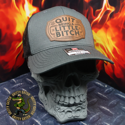 Quit Being a Little Bitch Patch Hat Richardson 112 Trucker Hat in Charcoal/Black from Gritty Gator