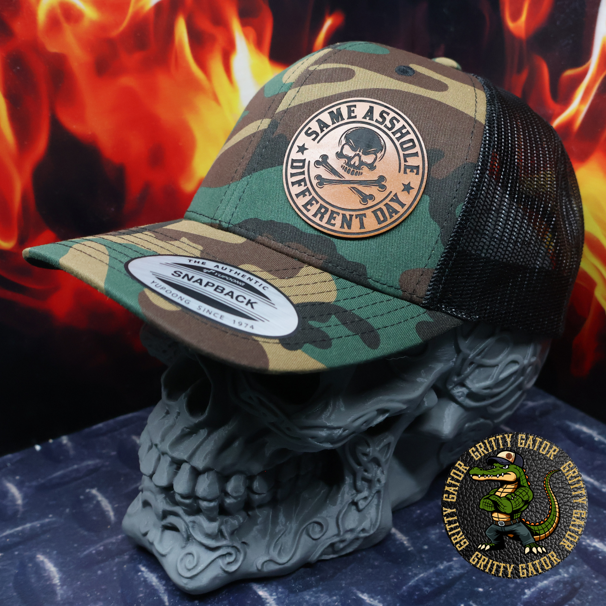 Same Asshole Different Day Patch Hat Yupoong 6606 Classic Trucker Cap in Green Camo/Black from Gritty Gator